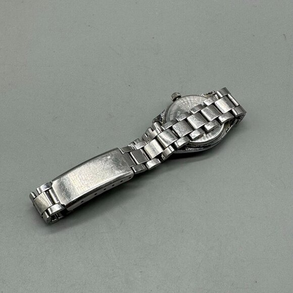 3/$30 Piratron Watch Women Silver Tone Day Date Quartz Classic Look 6.7 - Picture 11 of 15